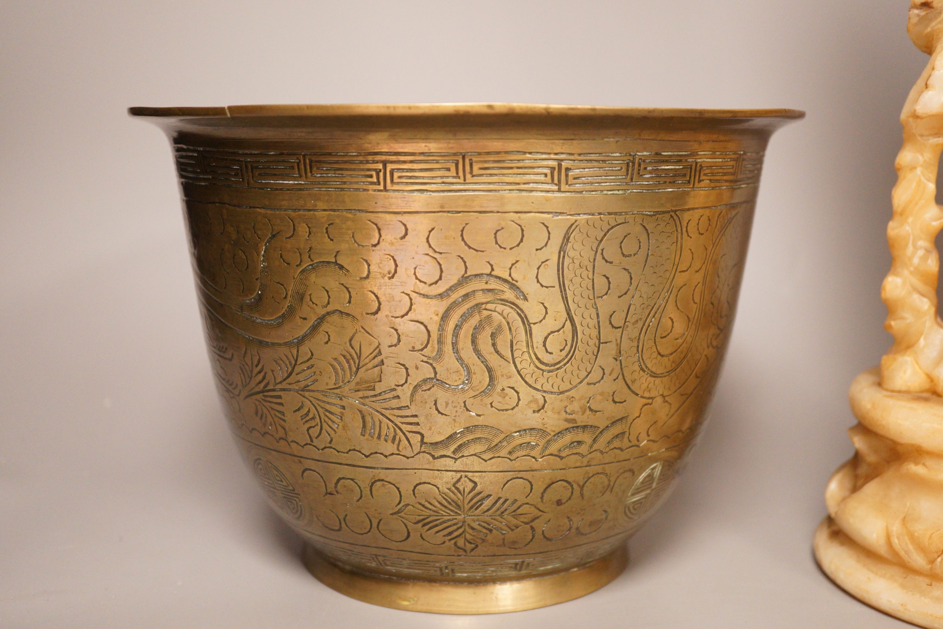 A Chinese bronze 'dragon' bowl, early 20th century and a large Chinese soapstone figure of Shou Lao, 28cm tall